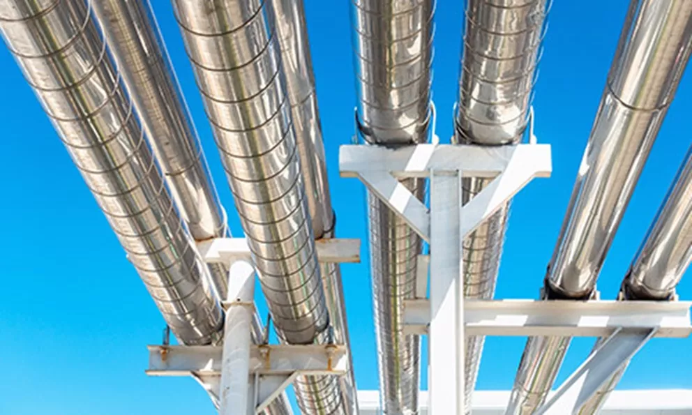 The role of emittance in the determination of the jacketing temperature