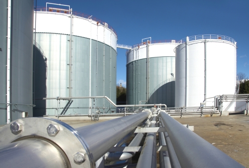 Gas tank and pipelines at oil and gas processing plant