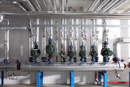 Pump , manometer, pipes and faucet valves of heating HVAC system
