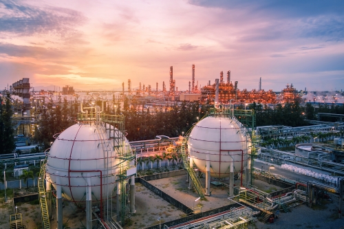 Insulated storage spheres at sunset