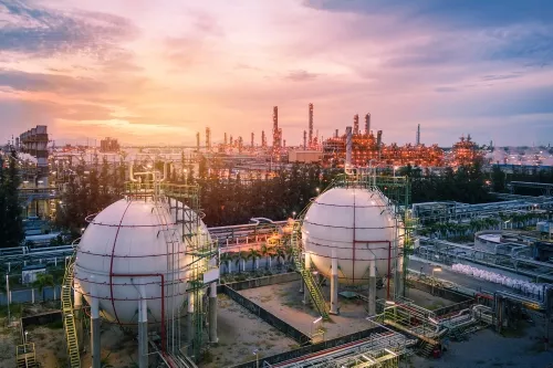 Insulated storage spheres at sunset