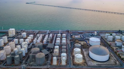 With foamglas insulated storage tanks at refinery